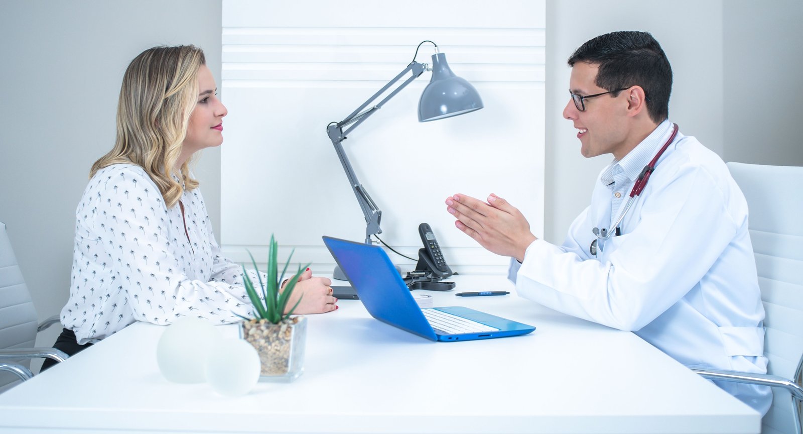 A woman in consultation with her doctor
